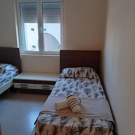New 9 * Tirana